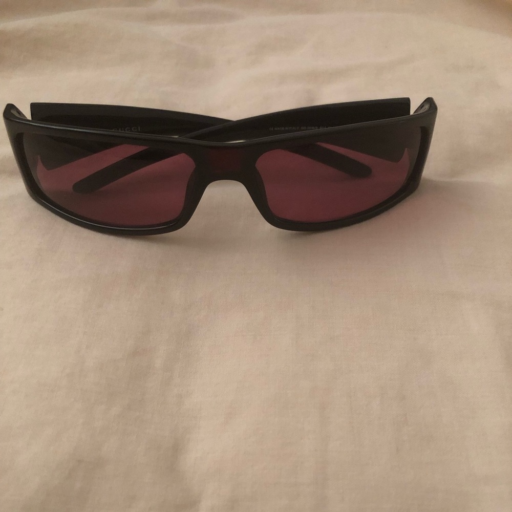 Gucci sunglasses.     Authentic.     Never worn.